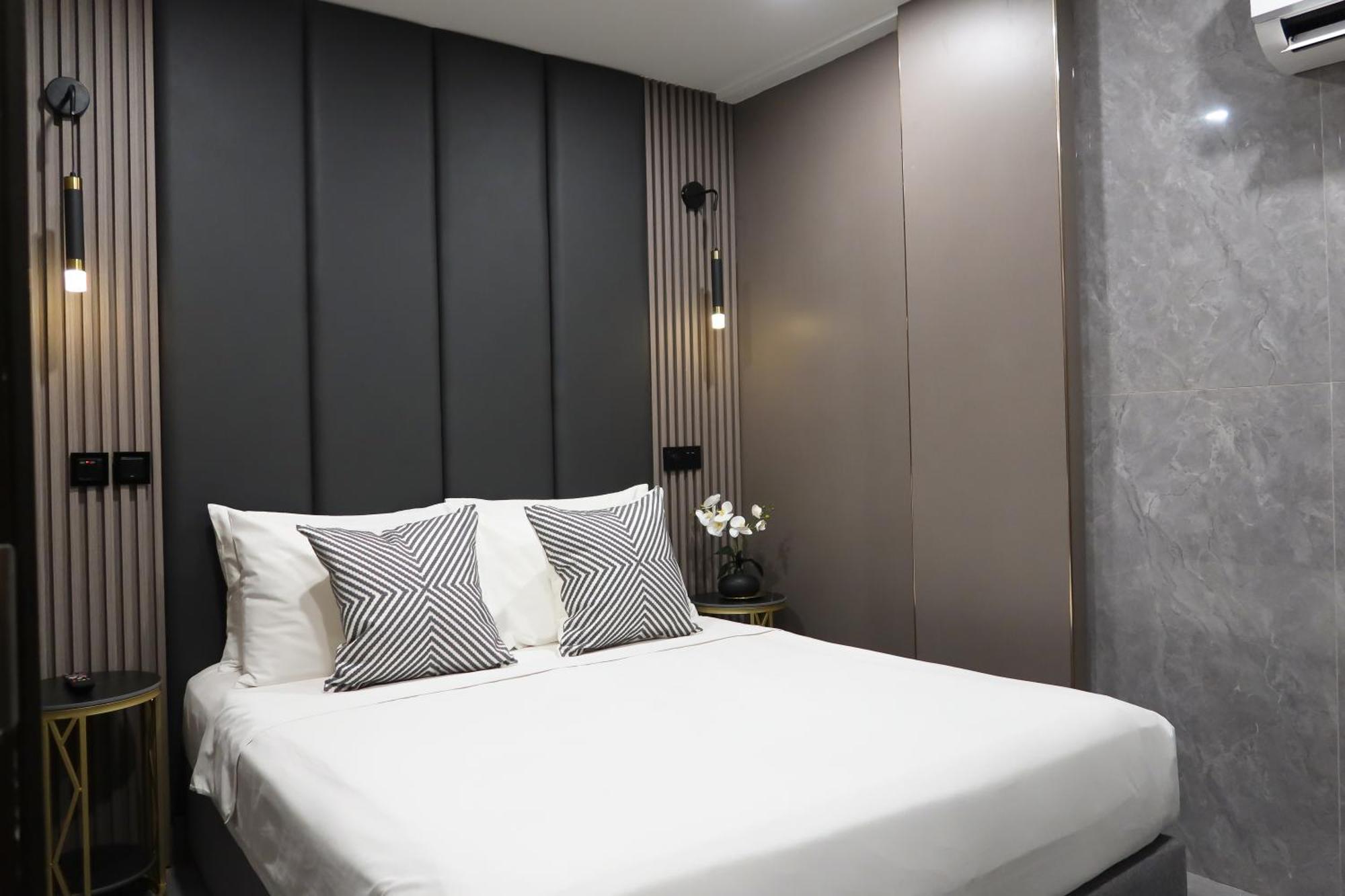 Recharge Studio Apartment & Suites Szingapúr Szoba fotó