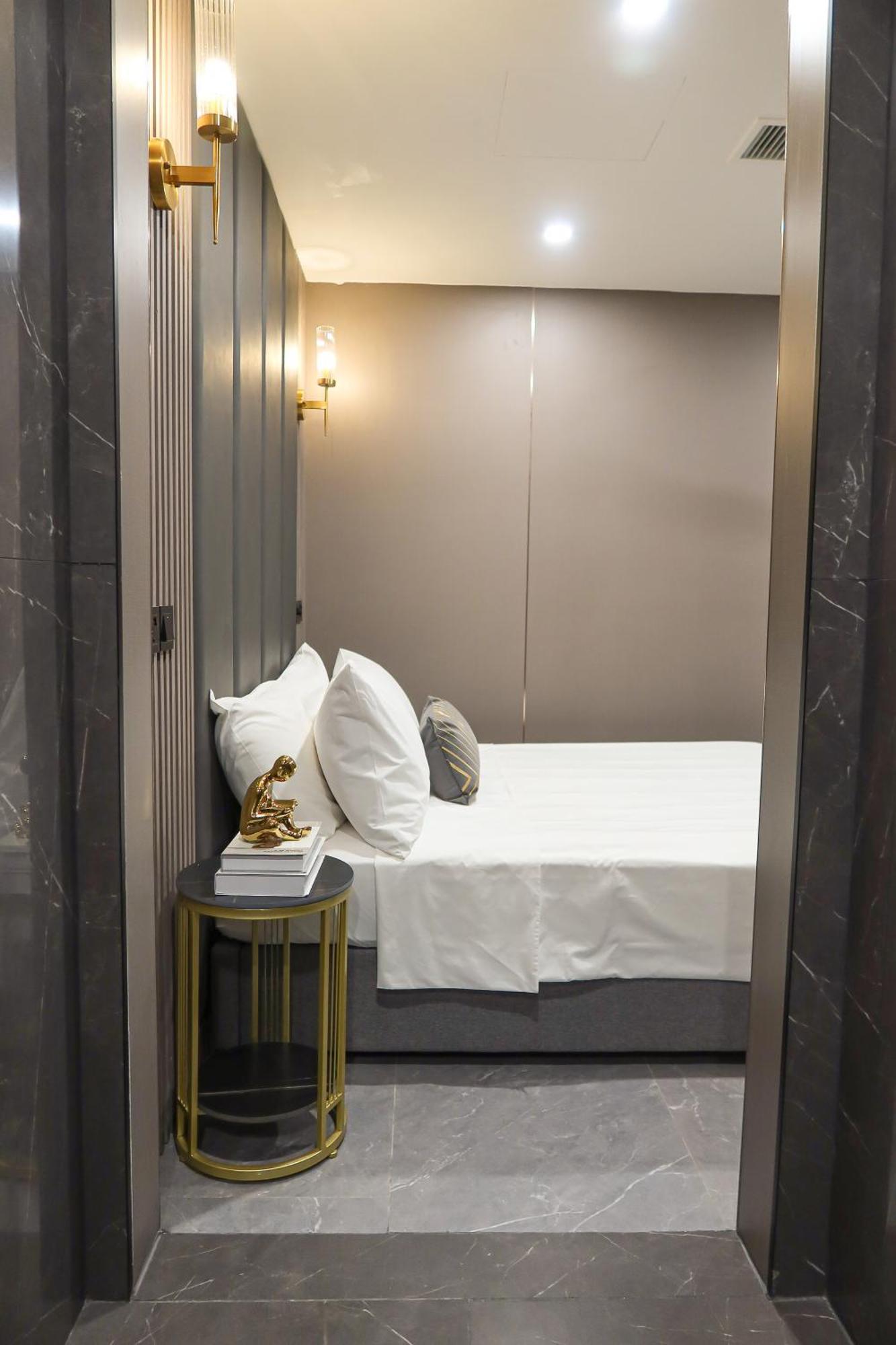 Recharge Studio Apartment & Suites Szingapúr Szoba fotó