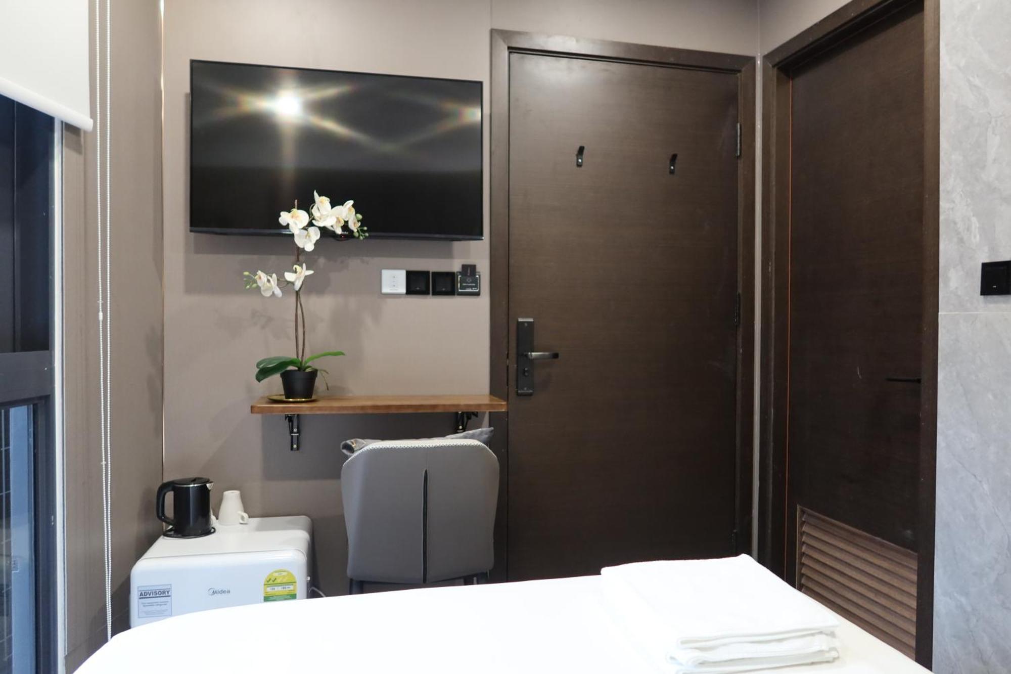 Recharge Studio Apartment & Suites Szingapúr Szoba fotó