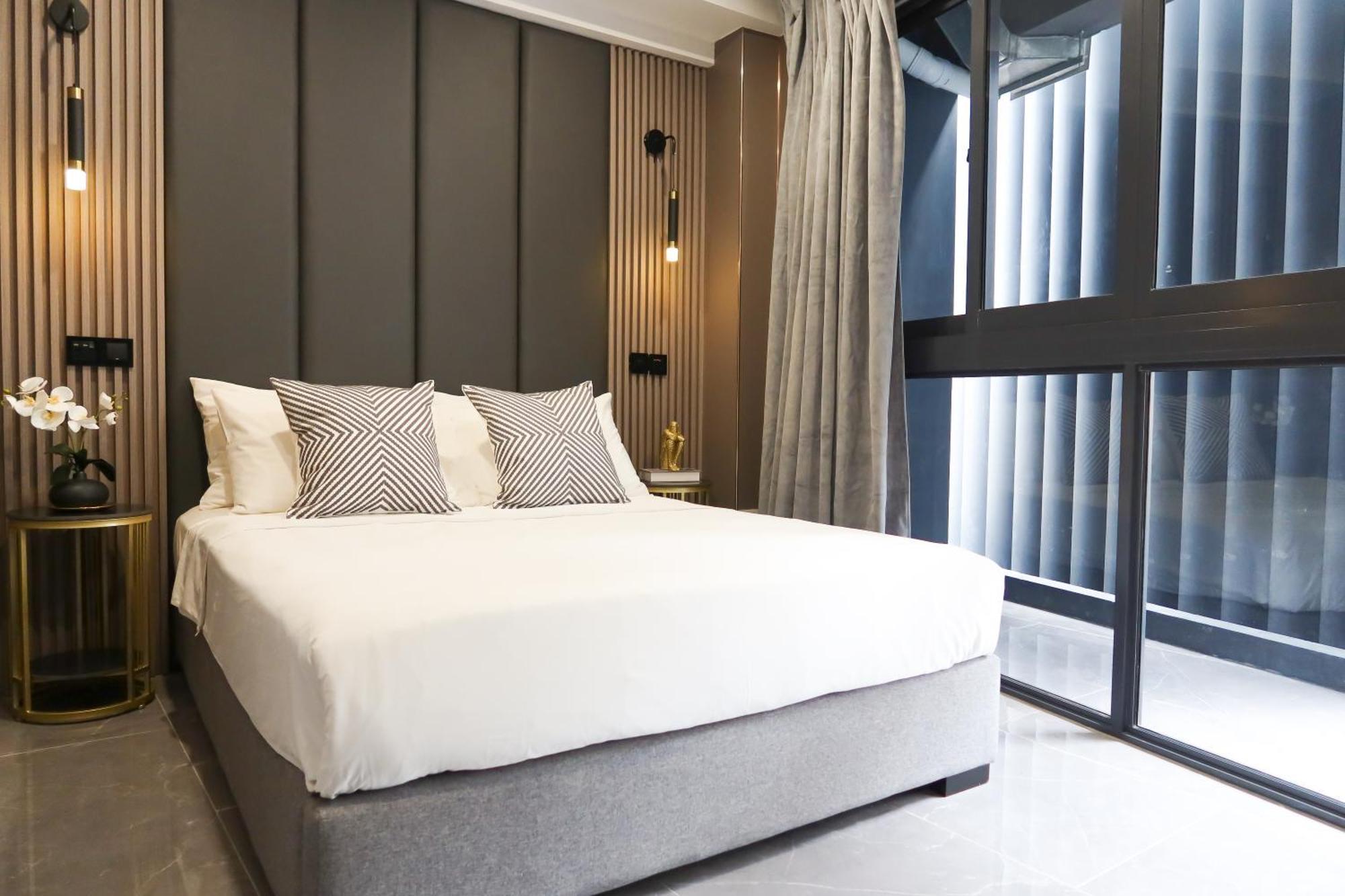 Recharge Studio Apartment & Suites Szingapúr Szoba fotó