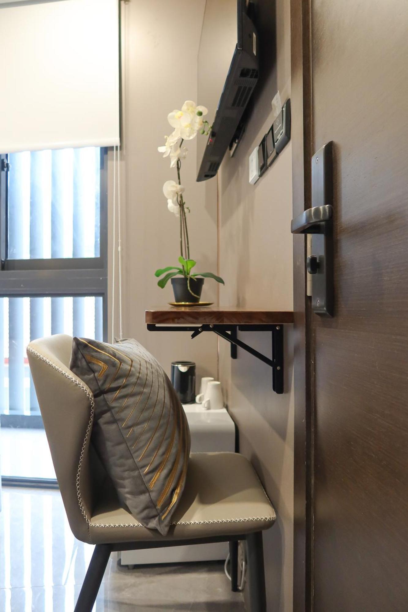 Recharge Studio Apartment & Suites Szingapúr Szoba fotó